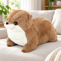 Dark chubby otter plushie on a living room sofa