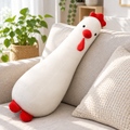 White fluffy chicken plushie on a sofa