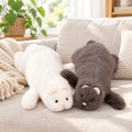 Fluffy ferret plushies on a living room sofa